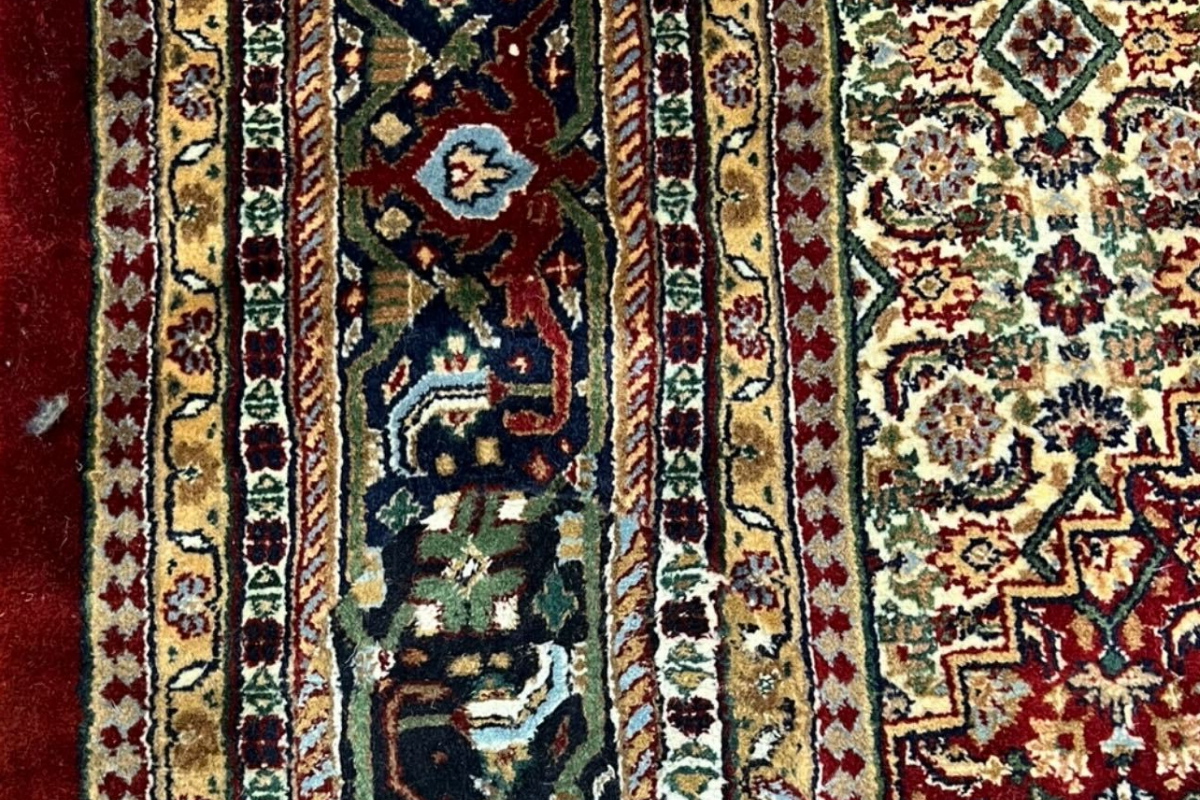 Persian Rugs Clinic logo – expert rug restoration and cleaning