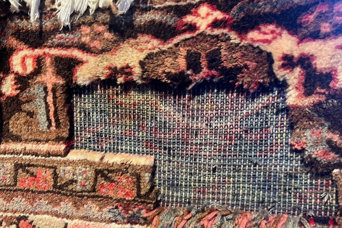 Persian Rugs Clinic logo – expert rug restoration and cleaning
