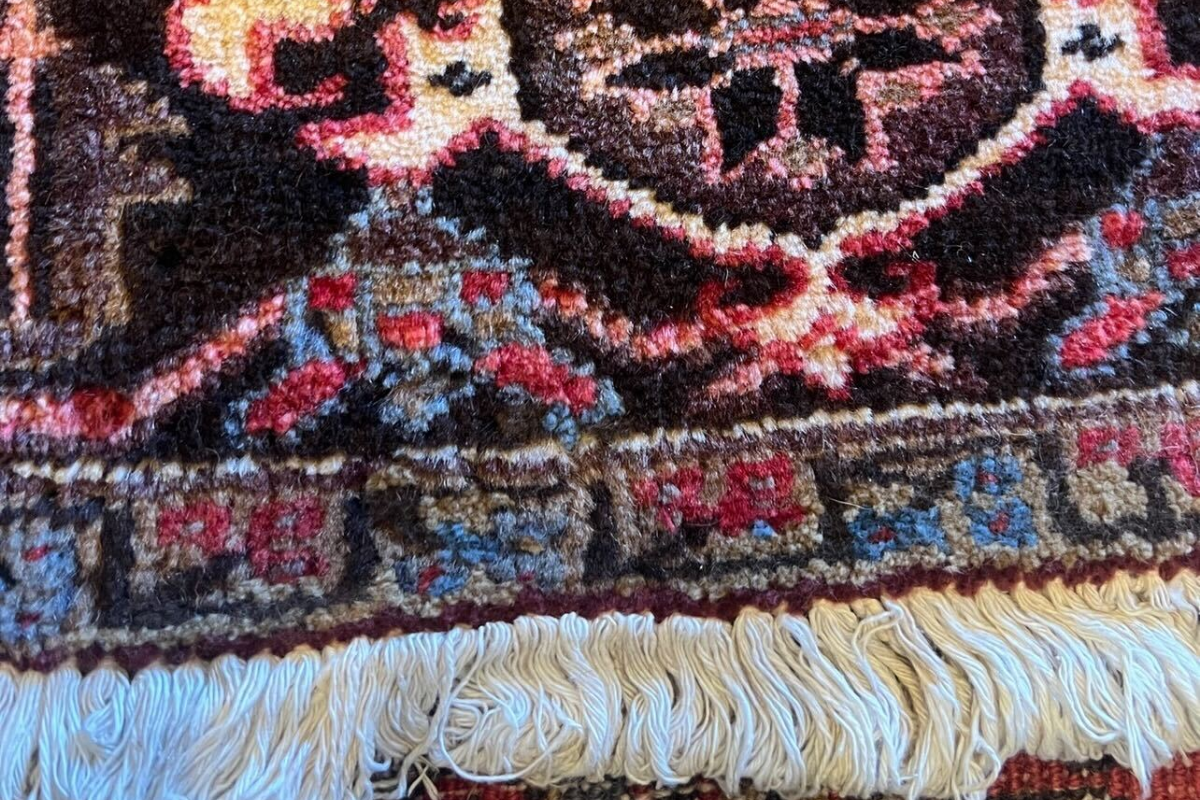 Persian Rugs Clinic logo – expert rug restoration and cleaning